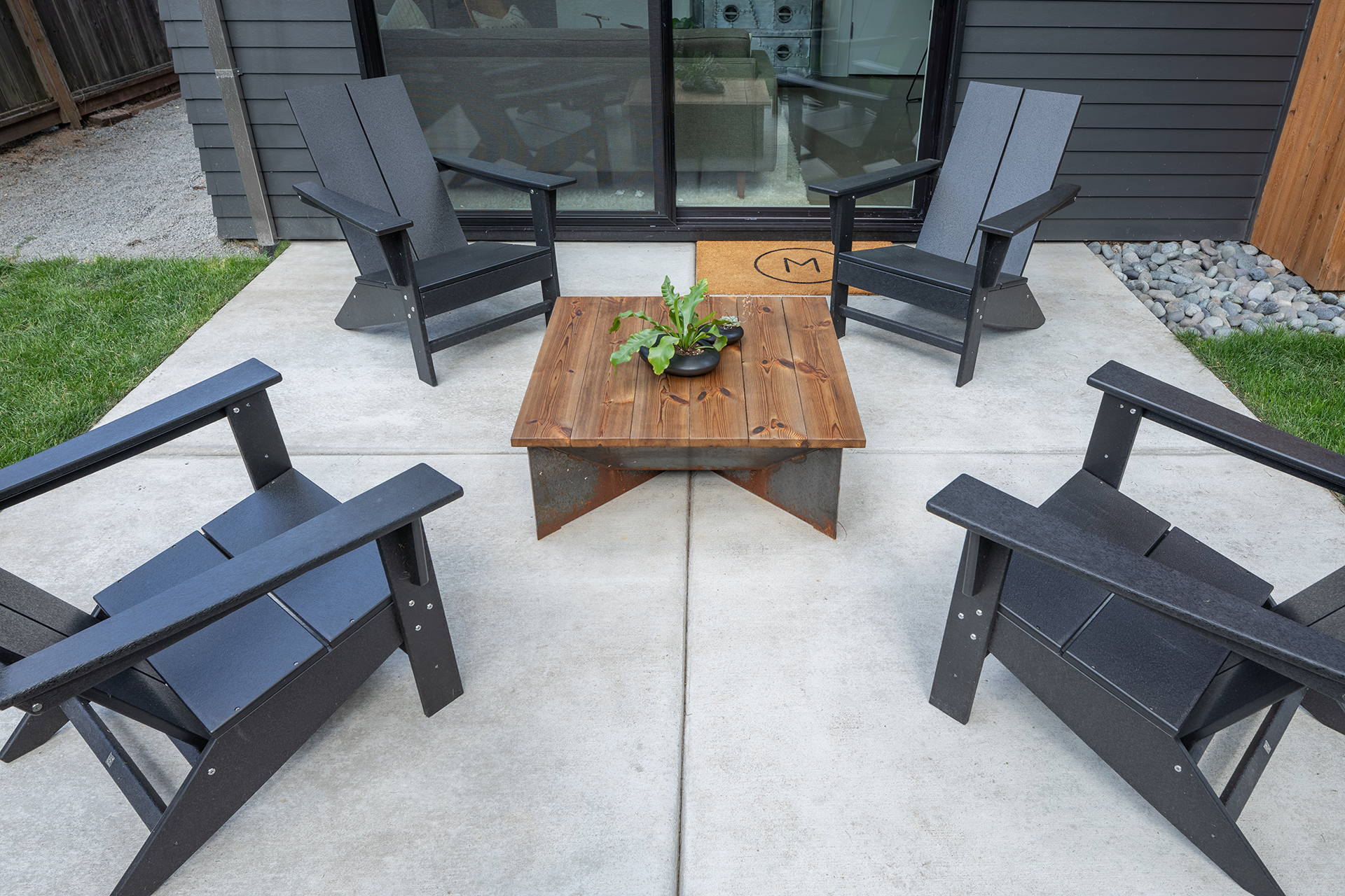 Broom-finished concrete patio with clean control joints